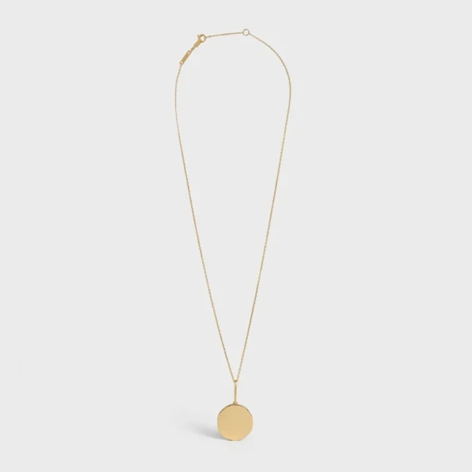 Petit collier Médaille CELINE en or jaune et diamants Petit collier Médaille CELINE en or jaune et diamants