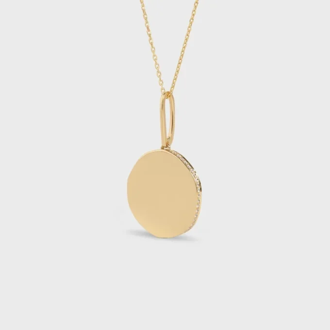 Petit collier Médaille CELINE en or jaune et diamants Petit collier Médaille CELINE en or jaune et diamants