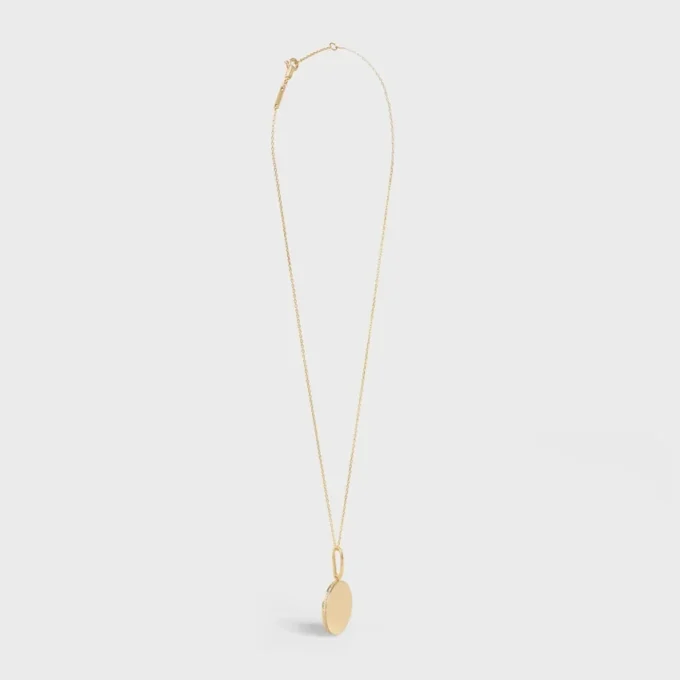 Petit collier Médaille CELINE en or jaune et diamants Petit collier Médaille CELINE en or jaune et diamants