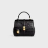 Petit sac 16 en crocodile Porosus Petit sac 16 en crocodile Porosus