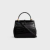 Petit sac 16 en crocodile Porosus Petit sac 16 en crocodile Porosus