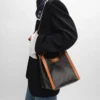 Petit sac cube en Triomphe Canvas et cuir de veau naturel