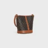 Petit sac seau en Triomphe Canvas et cuir de veau