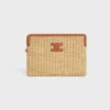 Petite pochette avec bandoulière en textile effet raphia et cuir de veau