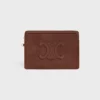 Petite pochette à bandoulière Cuir Triomphe en cuir de veau grainé