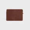Petite pochette à bandoulière Cuir Triomphe en cuir de veau grainé