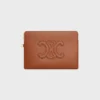 Petite pochette à bandoulière Cuir Triomphe en cuir de veau lisse