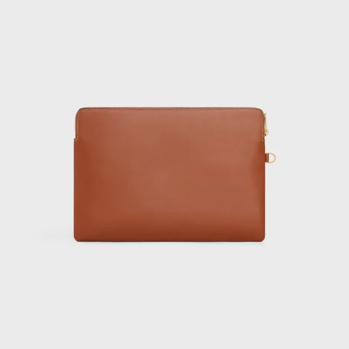 Petite pochette à bandoulière Cuir Triomphe en cuir de veau lisse