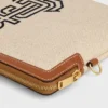 Petite pochette à bandoulière en textile avec broderie d&rsquo;ancres et cuir de veau