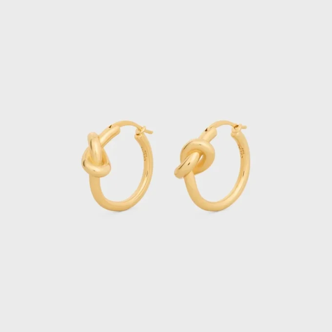 Petites créoles Knot en laiton avec finition dorée Petites créoles Knot en laiton avec finition dorée