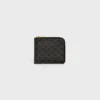Pochette zippée avec porte-cartes en Triomphe Canvas et cuir d’agneau Pochette zippée avec porte-cartes en Triomphe Canvas et cuir d’agneau
