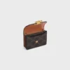 Porte-cartes de visite Triomphe Canvas et cuir d’agneau Porte-cartes de visite Triomphe Canvas et cuir d’agneau