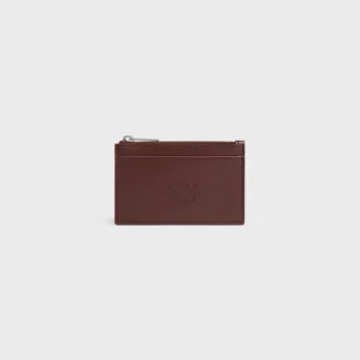 Porte-cartes zippé en cuir de veau satiné avec motif Triomphe en relief