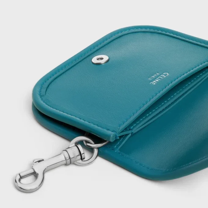 Porte-clés Nano Besace Triomphe en cuir de veau lisse Porte-clés Nano Besace Triomphe en cuir de veau lisse