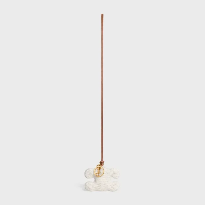 Porte-clés Triomphe Pom-Pom en crochet de coton avec finition dorée Porte-clés Triomphe Pom-Pom en crochet de coton avec finition dorée