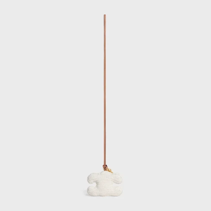 Porte-clés Triomphe Pom-Pom en crochet de coton avec finition dorée Porte-clés Triomphe Pom-Pom en crochet de coton avec finition dorée