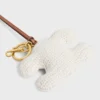 Porte-clés Triomphe Pom-Pom en crochet de coton avec finition dorée Porte-clés Triomphe Pom-Pom en crochet de coton avec finition dorée