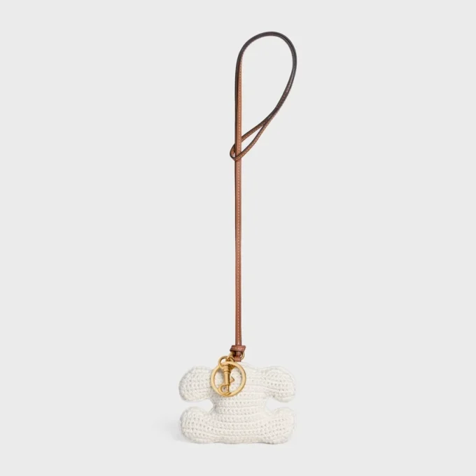 Porte-clés Triomphe Pom-Pom en crochet de coton avec finition dorée Porte-clés Triomphe Pom-Pom en crochet de coton avec finition dorée