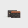 Portefeuille compact avec porte-monnaie Triomphe en Triomphe Canvas Portefeuille compact avec porte-monnaie Triomphe en Triomphe Canvas