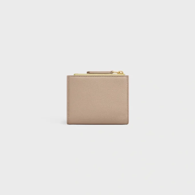 Portefeuille compact Triomphe Stamp en cuir de veau grainé souple