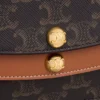 Portefeuille Duo à bandoulière en Triomphe Canvas et cuir de veau Portefeuille Duo à bandoulière en Triomphe Canvas et cuir de veau