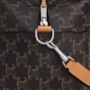 Sac à bandoulière Take Away en Triomphe Canvas et cuir de veau