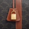 Sac de voyage moyen en Triomphe Canvas et cuir de veau