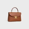 Sac Nino moyen en cuir de veau grainé souple Sac Nino moyen en cuir de veau grainé souple