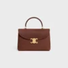 Sac Nino moyen en cuir de veau nubuck grainé Sac Nino moyen en cuir de veau nubuck grainé