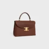Sac Nino moyen en cuir de veau nubuck grainé Sac Nino moyen en cuir de veau nubuck grainé