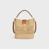 Sac seau Louise moyen en raphia et cuir de veau