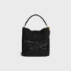 Sac seau Louise moyen en raphia et cuir de veau