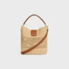 Sac seau Louise moyen en raphia et cuir de veau