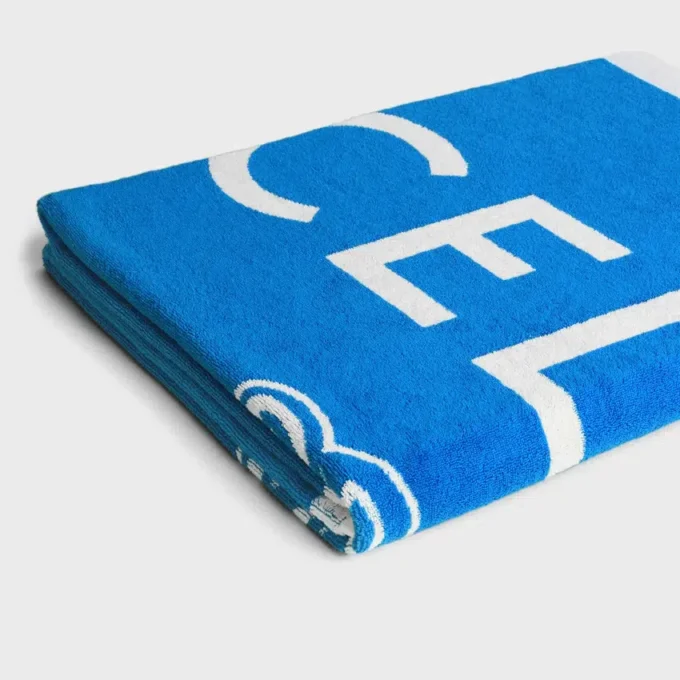 Serviette de plage en coton éponge CELINE Triomphe