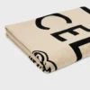 Serviette de plage en coton éponge CELINE Triomphe