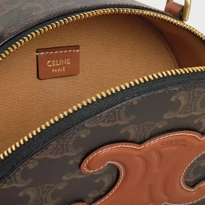 Étui Half Moon en Triomphe Canvas et cuir de veau