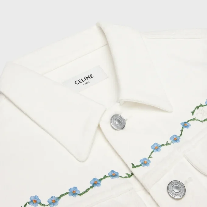 Veste de camionneur brodée en denim blanc délavé brut